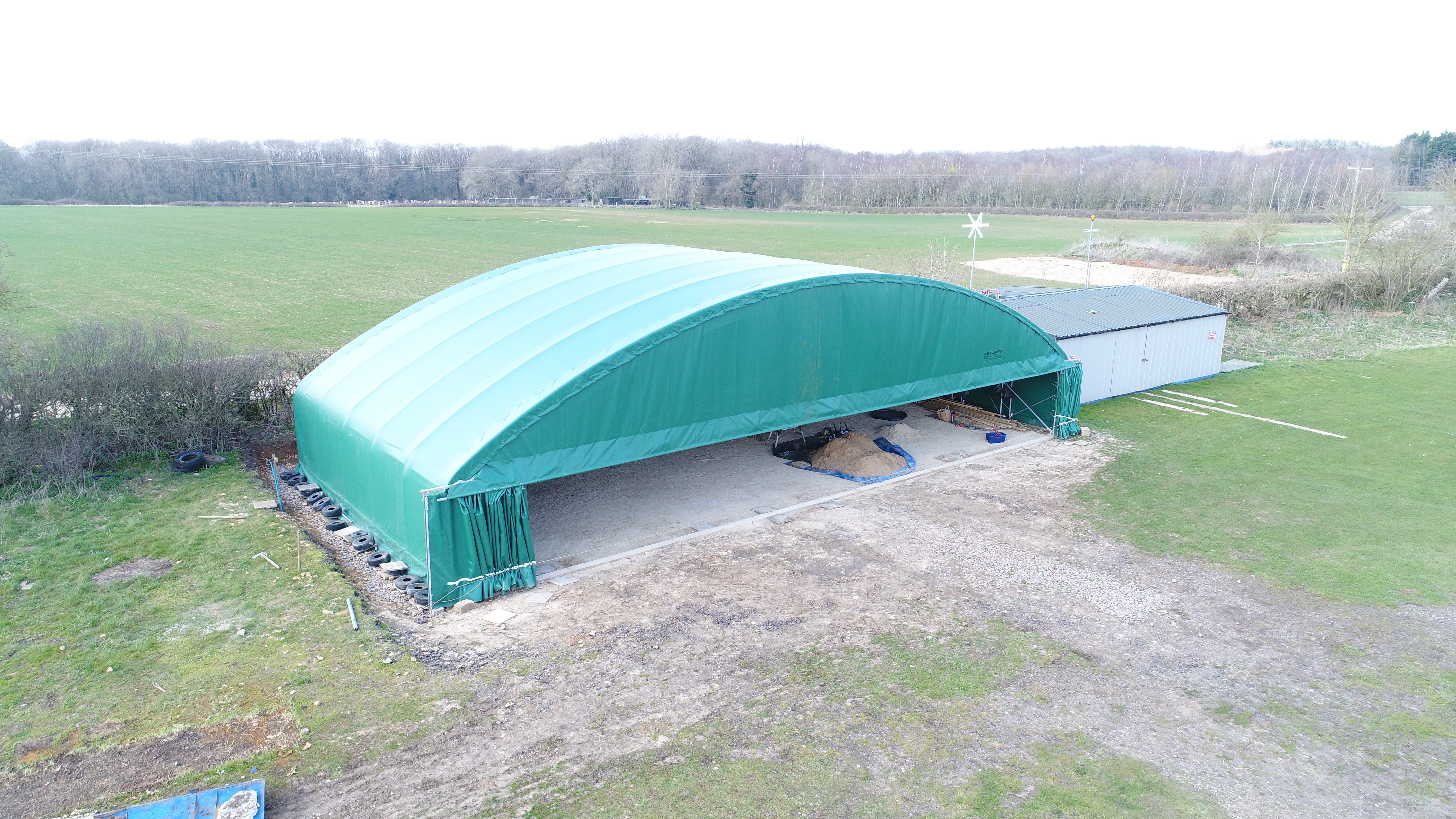 Double Truss – Fabric Aircraft hangar with Sliding rail door - Green