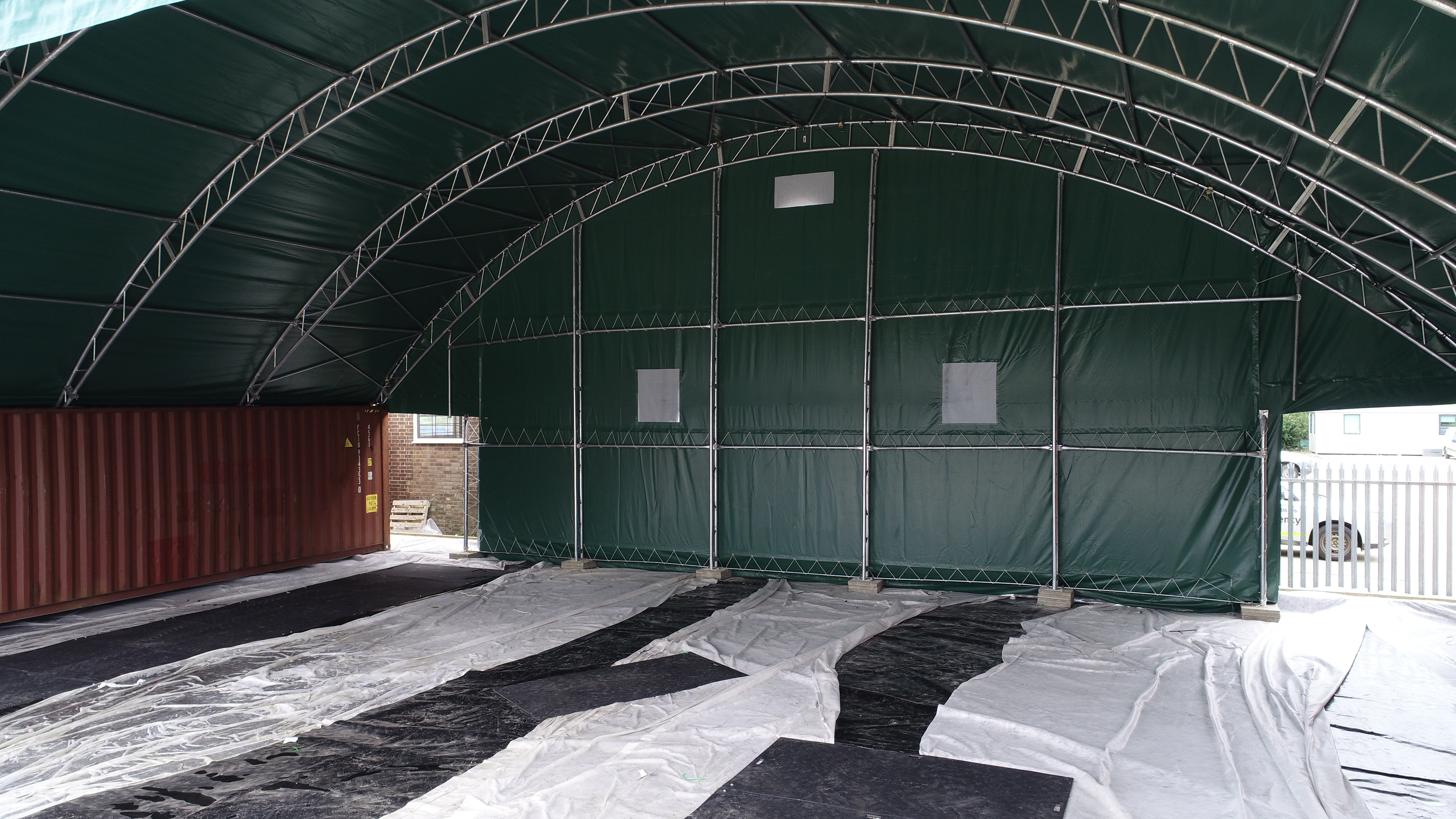 18m x 12m - Double Truss Container canopy - Closed back panel and half moon front panel Green