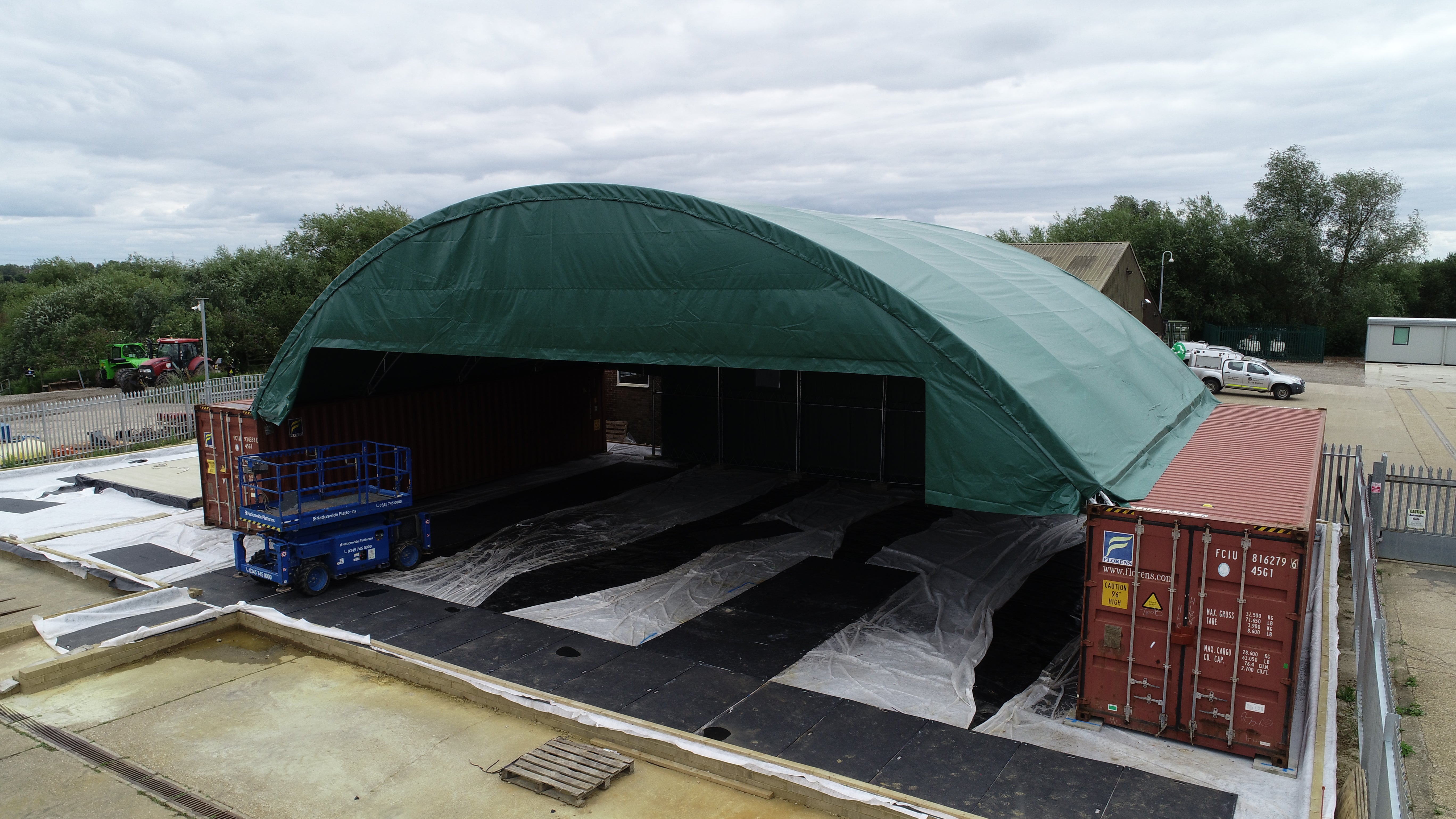 18m x 12m - Double Truss Container canopy - Closed back panel and half moon front panel Green