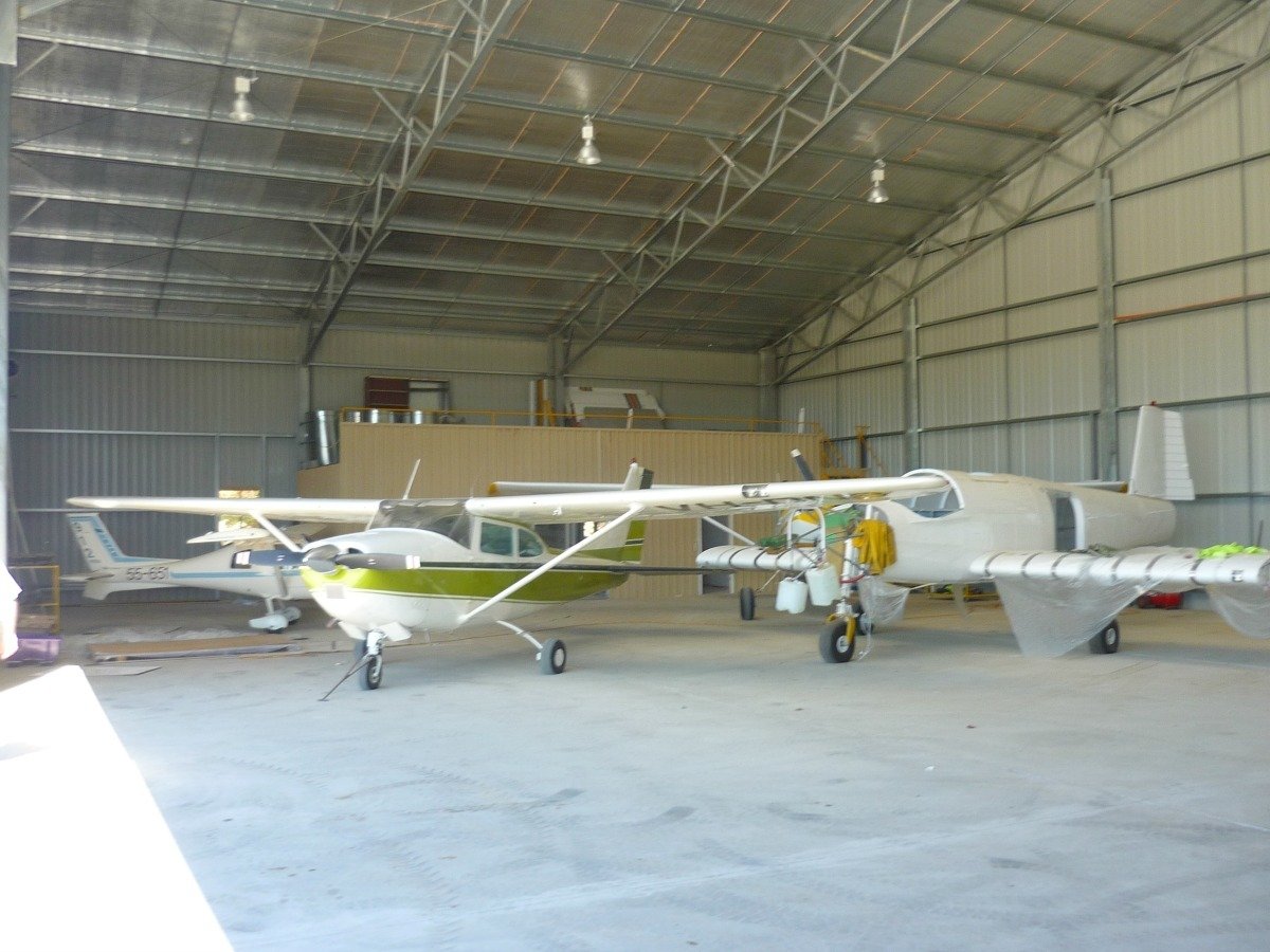 Double Truss - Single Sheet - Steel Aircraft hangar with Bi-Folding door